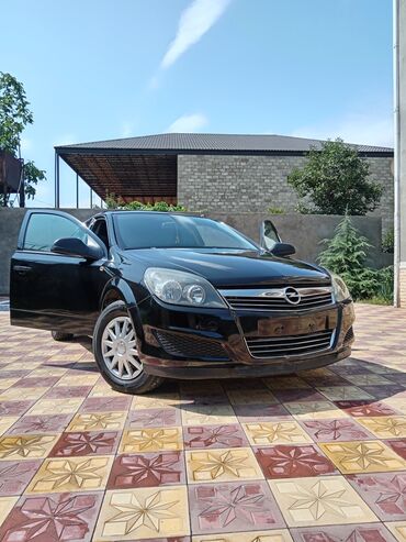 фольксваген тигуан л с: Opel Astra: 1.4 l | 2009 il 26000 km Sedan