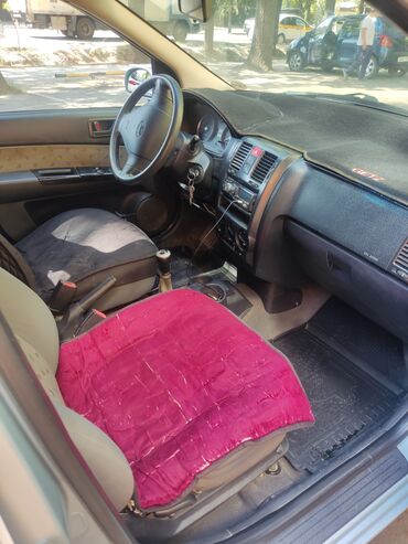 спортивные машина: Hyundai Getz в цвете серебристый металлик — это компактный пятидверный