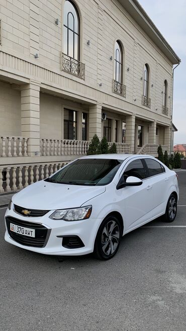 где купить машину дешевле: Chevrolet Sonic: 2019 г., 1.4 л, Автомат, Бензин, Седан