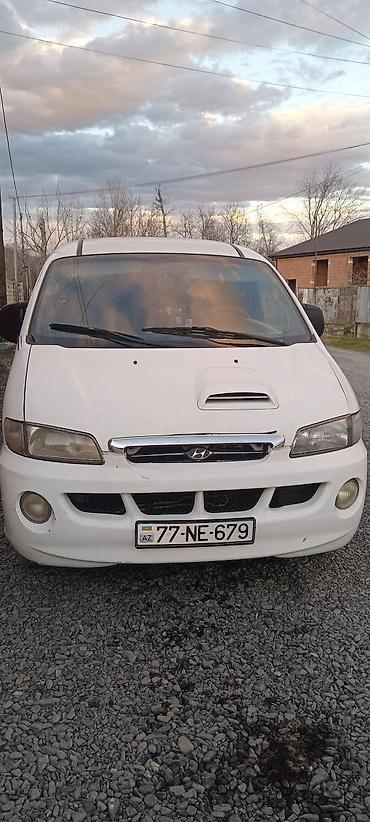 daewoo gentra stop: Hyundai H-1/Starex mikroavtobus – ağ rəng, 77-NE-679 dövlət nömrə — 1