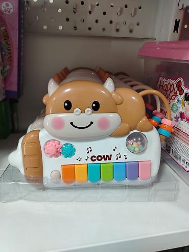 quick push pop it: Развивающая игрушка “Cow” — музыкальная коровка - Интерактивная — 1