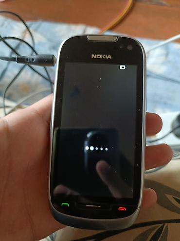 nokia communicator e90: Nokia 701, 8 GB, rəng - Gümüşü, Sensor — 1