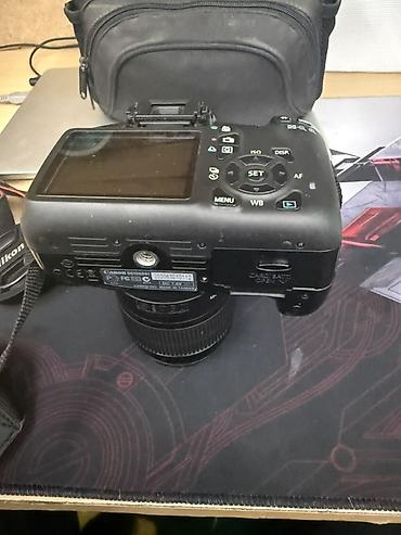 свет для видеосьемки: Зеркальная фотокамера Canon EOS 1000D (Rebel XS) с комплектным — 4