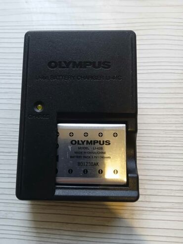 скупка фотоаппарат: OLYMPUS. Зарядка + батарейка для фотоаппарата OLYMPUS .В идеальном