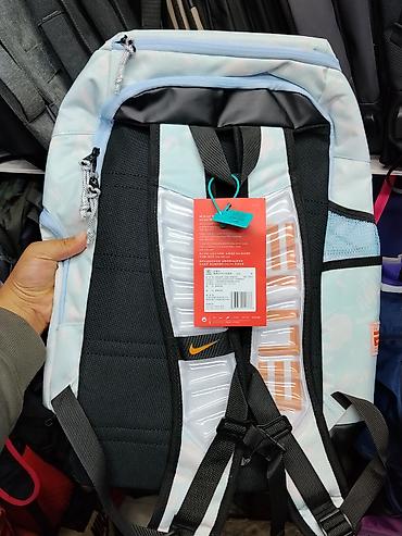 dlivery bag: Рюкзак Nike (голубой с абстрактным светлым камуфляжем и оранжевыми — 2