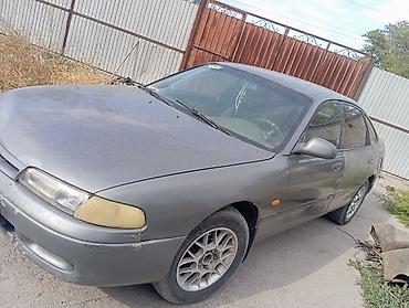 tesla 3: Mazda 626: 1995 г., Бензин, Седан — 7