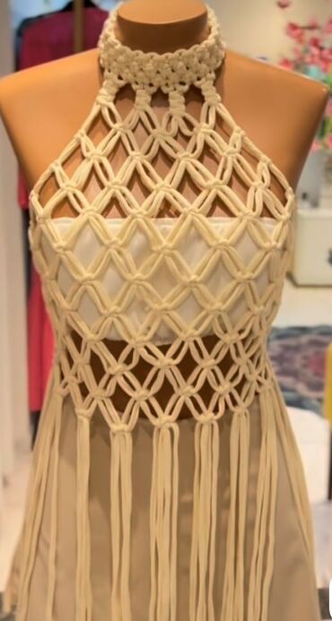 Ətəklər: Makrame toxunuşlu, ağ rəngdə qısa ətək. Bu ətək kəmər hissəsində iplə — 11