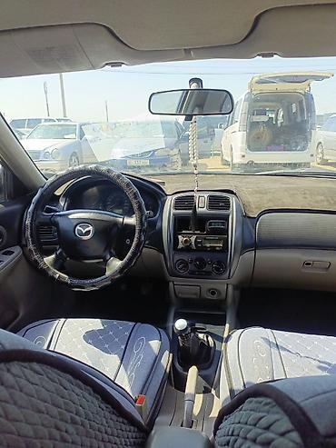 мицу биси: Mazda 323: 2002 г., Механика, Бензин, Универсал — 5