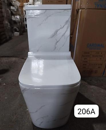 unitaz bacok: Unitaz. Unitazlar . Dekorlu model unitaz. Eyni belə dekorlu tülpanda — 2