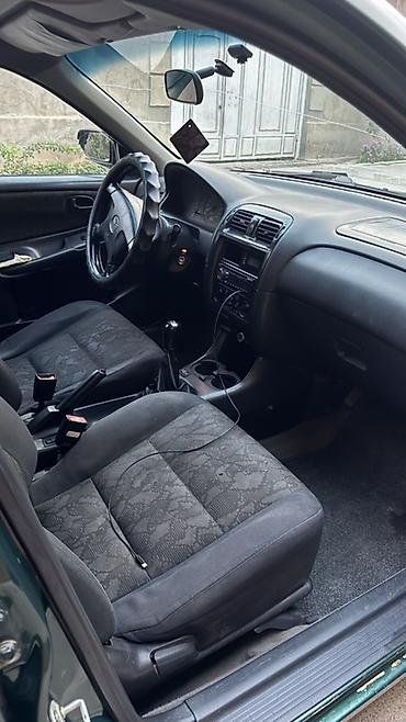 mazda 6 авто: Mazda 626: 1998 г., 1.8 л, Механика — 3