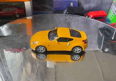 Avtomobil modelləri: Коллекционная модель Nissan 370Z Z34 yellow 2008 DeAgostini Scale — 9
