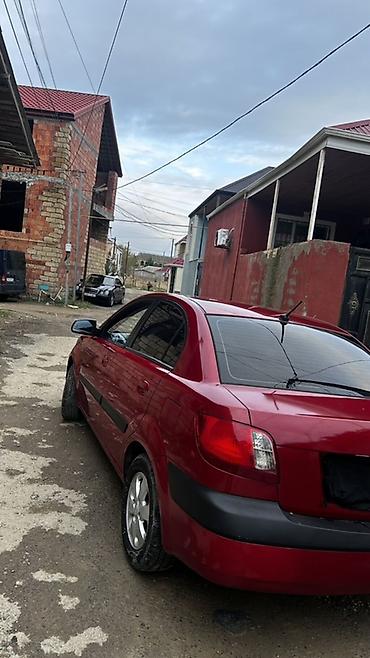 90 fa 373: Kia Rio: 1.4 l | 2010 il Sedan — 7