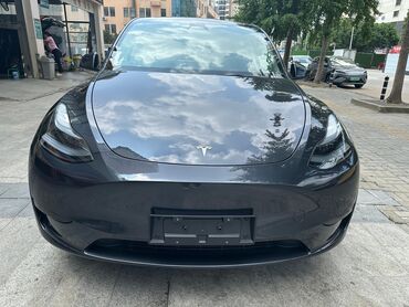 электромобиль neta: Tesla
