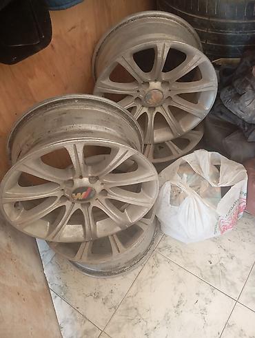 15 diski: Mühərrik diskləri – 4 ədəd bmw yüngül lehimli disk dəsti . - — 2