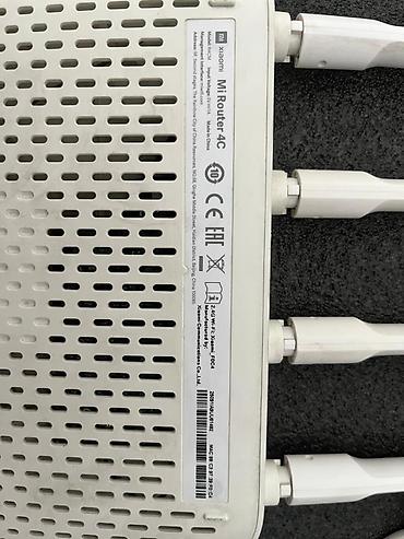 poco 6: Wi‑Fi роутер Xiaomi Mi Router 4C (модель R4CM) Комплектация: - роутер — 2