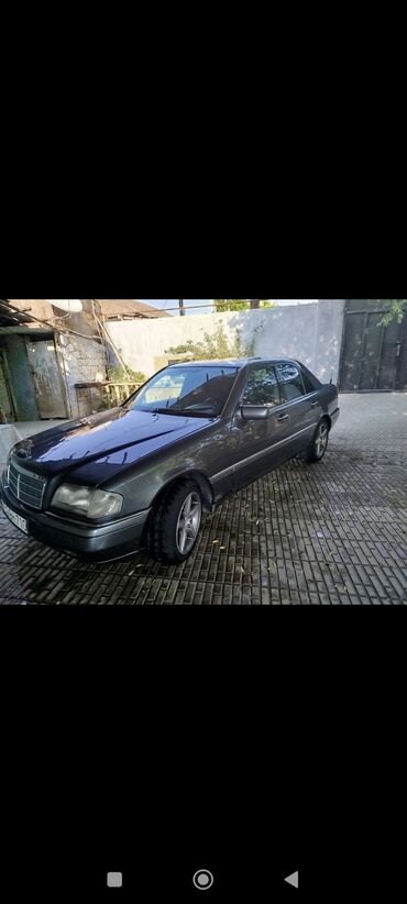 ayaq altı işıqlar: Mercedes-Benz C 180: 1.8 l | 1994 il Sedan