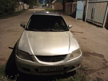 кузов тент штора: Mazda Familia: 2002 г.