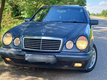 mersedes karopka: Mercedes-Benz 230: 2.3 l | 1996 il Sedan