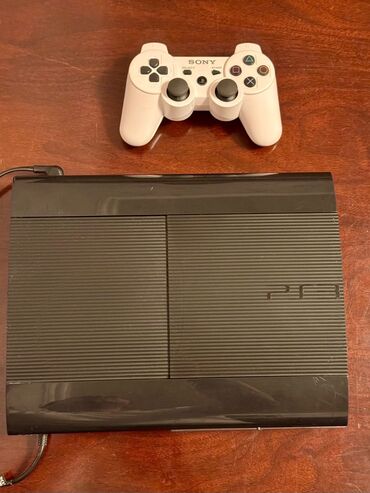 Playstation 3 Super Slim,super veziyyetdedir,60dan cox oyun var icinde