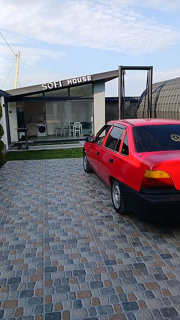 daewoo nexia 2005: Qırmızı rəngli Daewoo Nexia sedan. Avtomobil 4 qapılı kuzova — 8