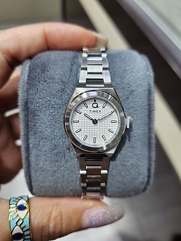 irsad saat: Timex Q seriyasından zərif qadın qol saatı - Korpus və qolbaq — 2