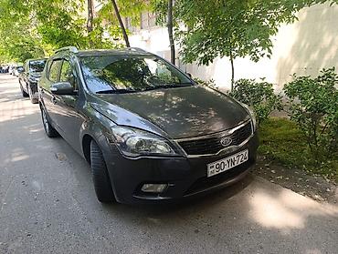 vaz 2107 kreditle: Kia Cee’d SW (universal) – tünd boz rəng, 5 qapılı, dam relsləri ilə — 1