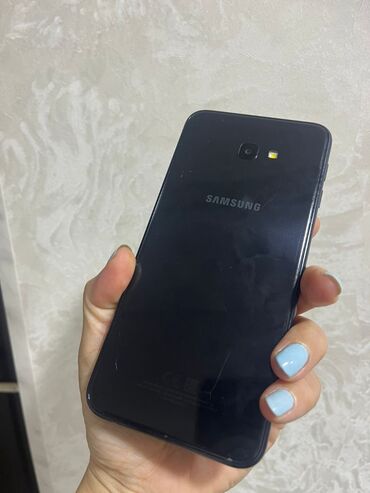telefon flai s 2018 goda: Samsung Galaxy J4 2018, Сенсорный, Face ID