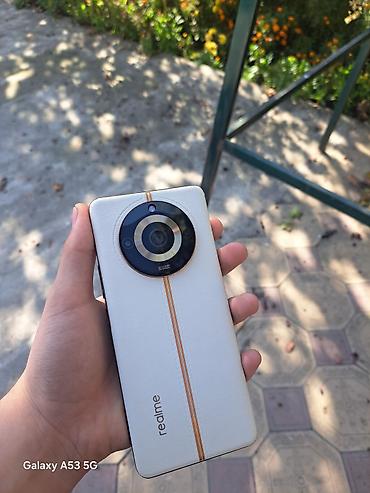 видо камера: Realme 11 Pro, Б/у, 256 ГБ, цвет - Белый — 2