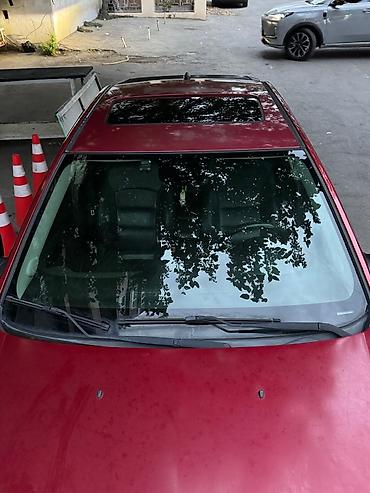 cankan masin: Chevrolet Cruze sedan – qırmızı rəngli, Azərbaycan nömrə nişanı ilə — 3