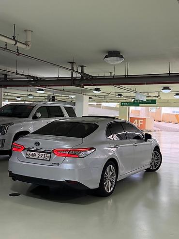 100: Toyota Camry: 2020 г., 2.5 л, Вариатор, Гибрид, Седан — 4