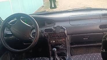 гак м 6: Mazda 626: 1996 г., 1.8 л, Механика, Бензин, Лифтбек — 5