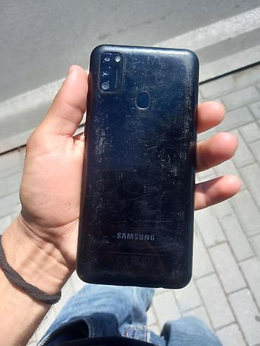 retro telefonlar: Samsung Galaxy M21 2021, 64 GB, rəng - Qara, Barmaq izi — 2