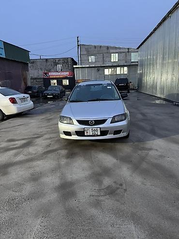 Mazda: Mazda 323: 2003 г., 1.3 л, Механика, Бензин, Универсал — 10