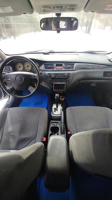 Mitsubishi: Mitsubishi Lancer: 2004 г., 1.6 л, Автомат, Бензин, Универсал — 6