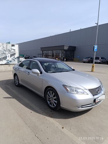 электро мотоцикыл: Седан Lexus ES 350 серебристого цвета с черной крышей. Автомобиль
