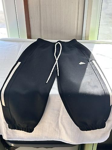 tech fleece: Спортивные брюки/джоггеры черного цвета - Материал: плотный — 1