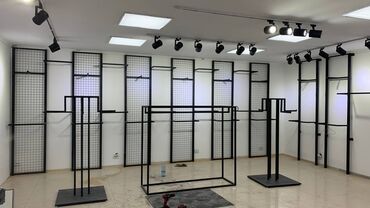 Кронштейны, стойки: Вешалки для магазина одежды Полки для магазина обуви Кронштейн Стеллаж — 4