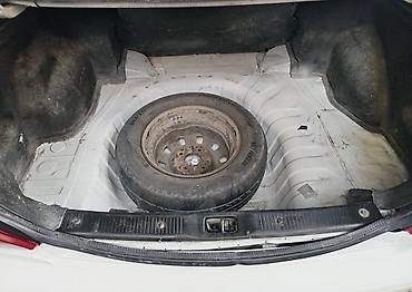 4 göz maşın: Nissan Sunny: 1.6 l | 2004 il Sedan — 9