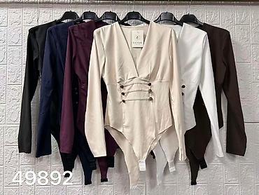 dsquared beograd: Bodi
Cena 2200
Uni vel.
 Vel.18 — 6