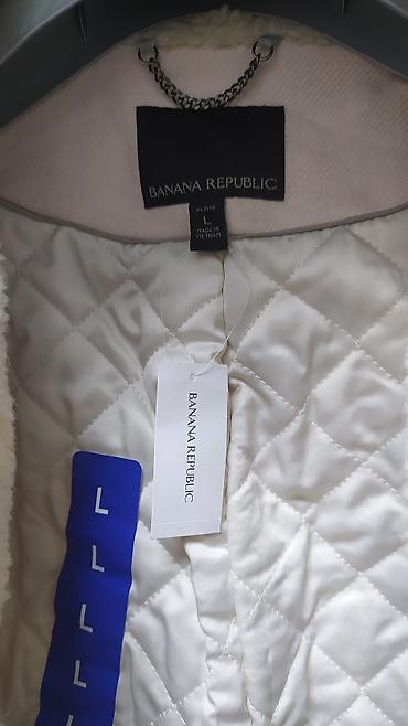 Пуховики и зимние куртки: Женская куртка. Размер L — 6