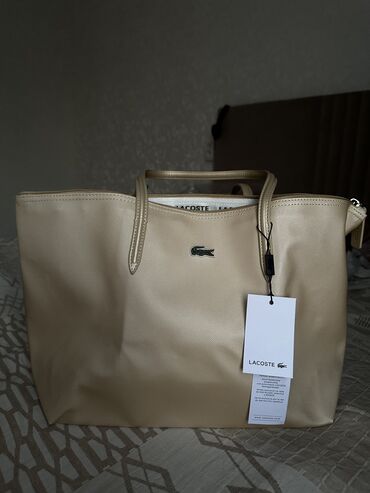 butun кошелек цена: Сумка Lacoste🐊
🏷️ 1500 сом
В подарок идет мягкая косметичка🫶🏾