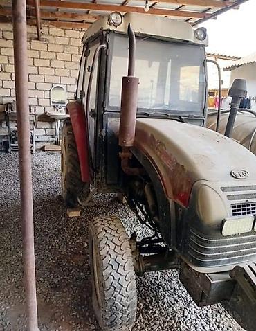 yuk qaldiran kranlar: Kənd təsərrüfatı traktoru və bağ çiləmə aparatı (ventilyatorlu — 2