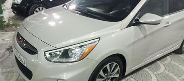 ford focus hatchback: Hyundai Accent: 1.6 l | 2015 il Sedan — 2