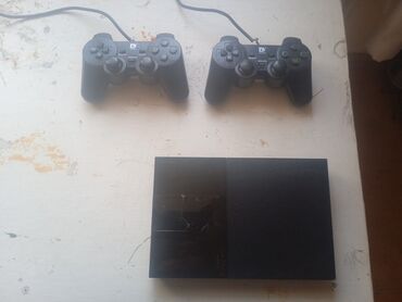 PS2 & PS1 (Sony PlayStation 2 & 1): PLAYSTATION 2 SUPER SLIM satılır heç bir problemi yoxdur 2 pult və 13
