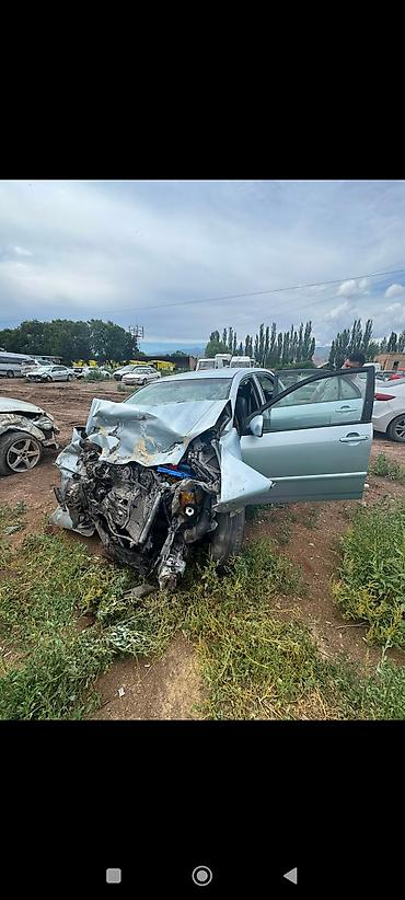 Toyota Corolla E120 2006 голубой. Автомобиль после сильного