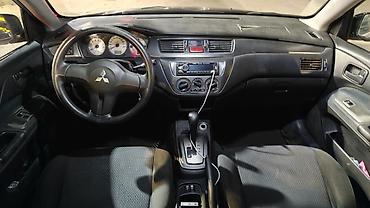митсубиси ево: Mitsubishi Lancer: 2006 г., 1.6 л, Автомат, Бензин, Седан — 5