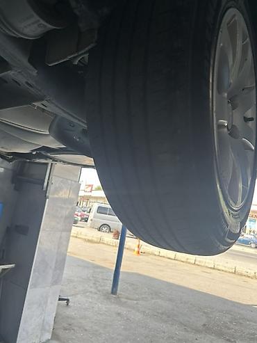 07 masin: Volkswagen orijinal 15" yüngül lehimli disklər və şinlər komplekti — 6