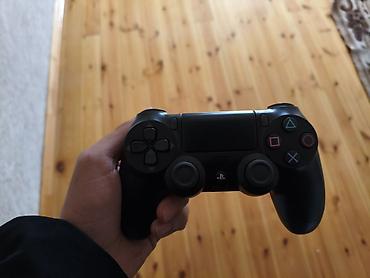 nintendo switch qiymeti: PlayStation DualShock 4 simsiz oyun pultu – orijinal model, qara rəng — 1