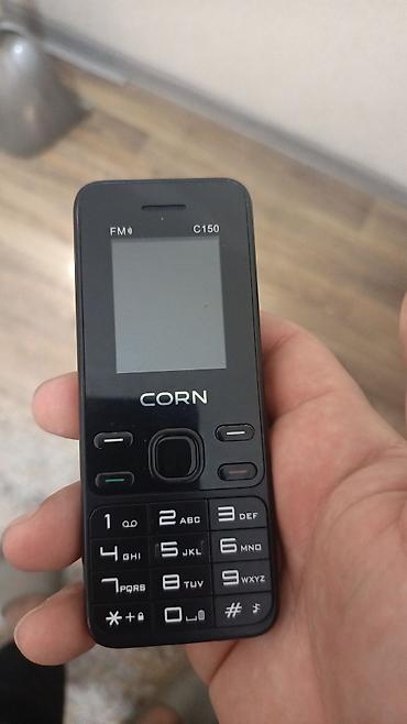 focus cool beko ne demek: CORN C150 düyməli mobil telefon - Kompakt korpus, qara rəng - İri və — 1