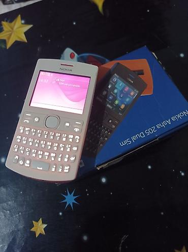 смарт часы с сим картой: Nokia Asha 230, 32 ГБ, цвет - Розовый, Две SIM карты — 1